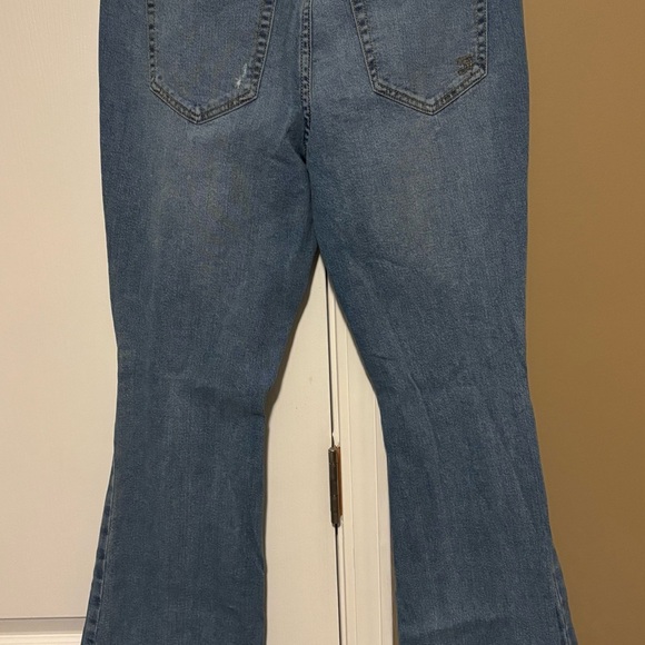 Seven7 Light Blue Slim Flare Jeans with Distressed Accents. - Picture 3 of 6